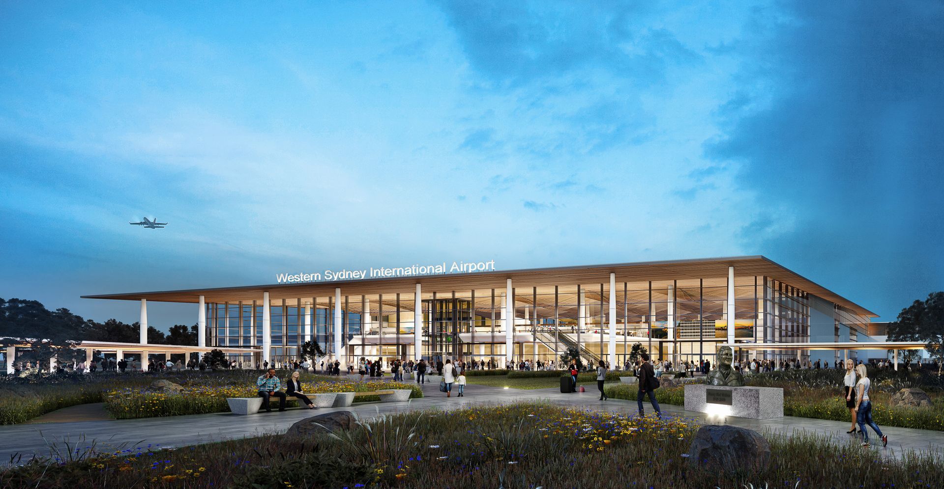 Modern airport exterior at dusk with people walking; plane in sky.