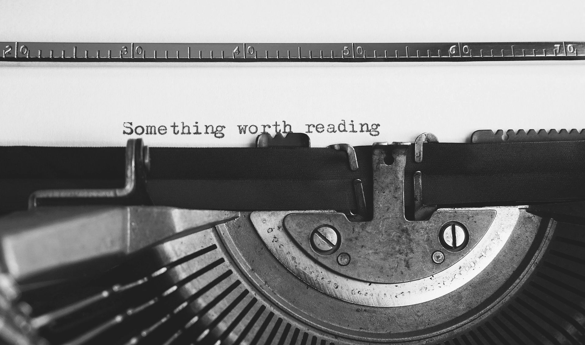 Close-up of a typewriter typing the words 
