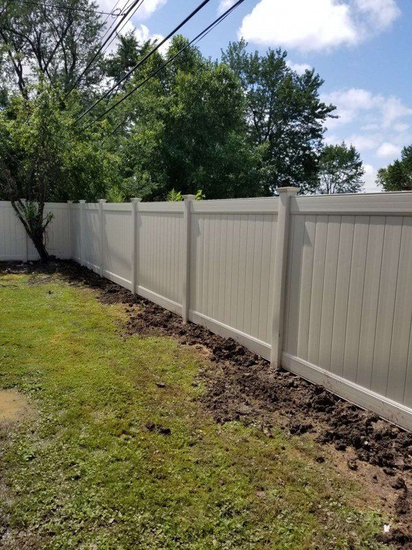 White Vinyl Privacy Fence Installation