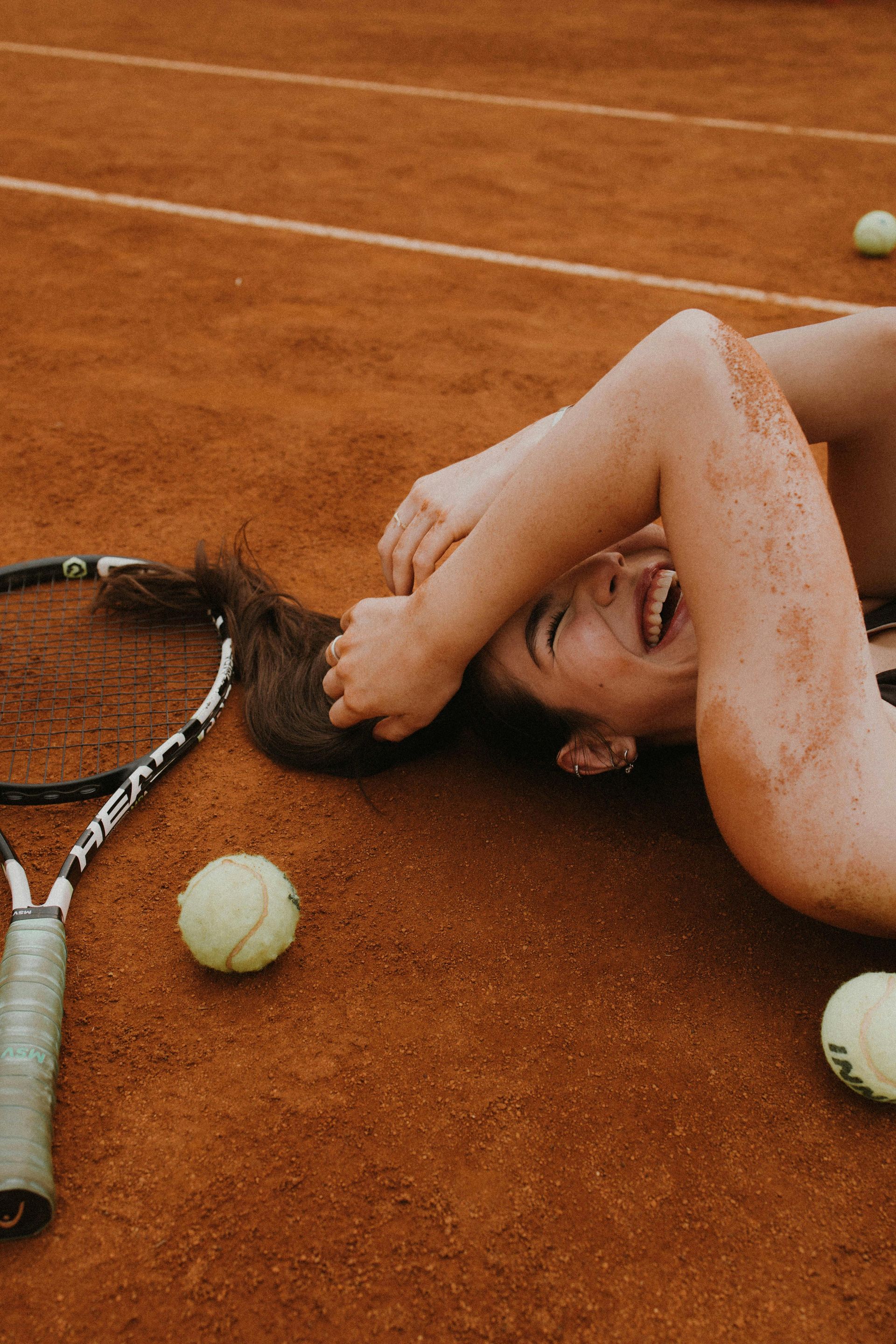 Player practicing mindful tennis on a scenic court at sunrise ,