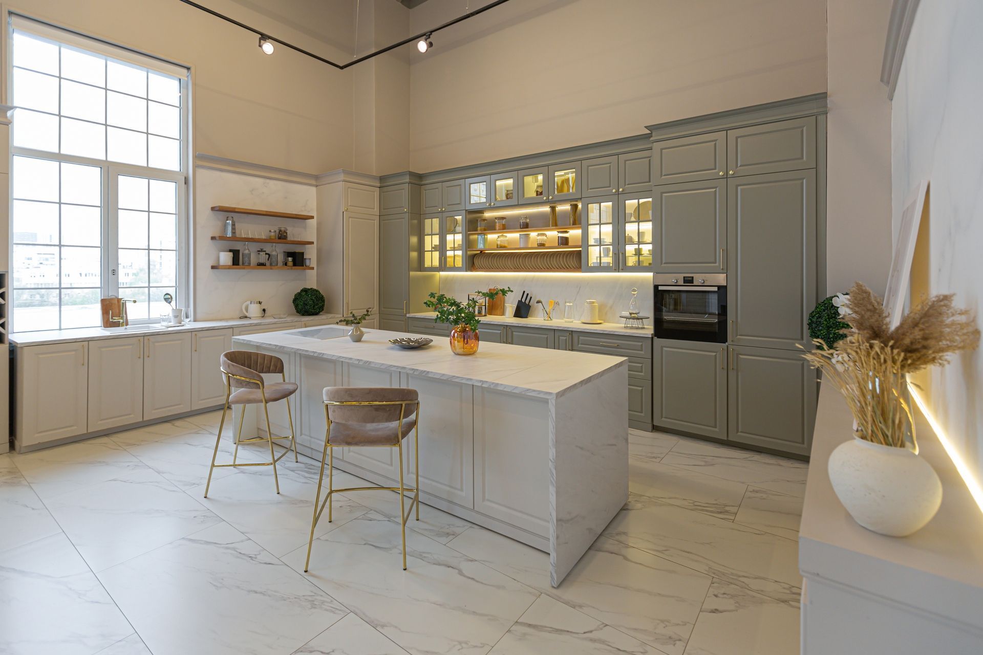 A large kitchen with a large island in the middle of the room.