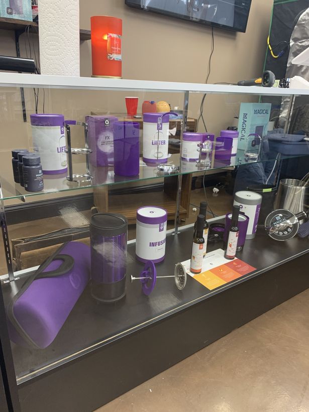 Glass Case Display at Growpher showing more Ardent Products for making infused butter, oils, and culinary treats
