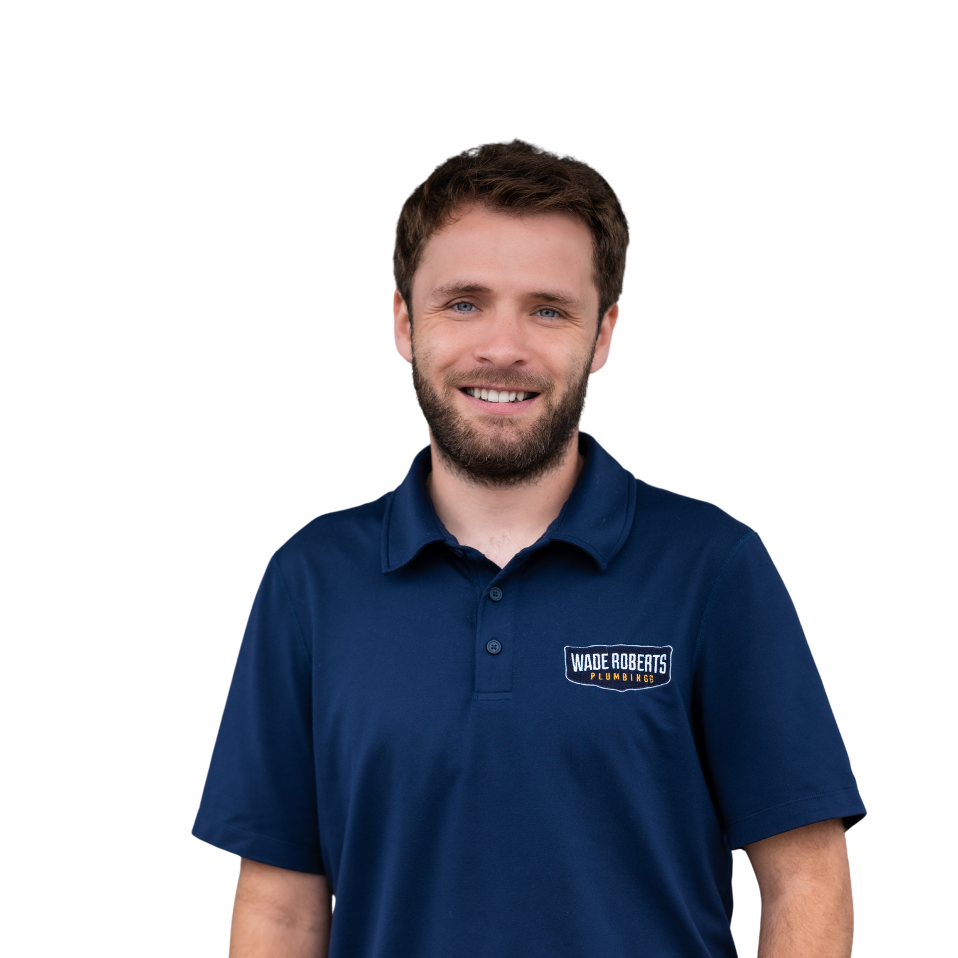 A man with a beard is smiling and wearing a black shirt