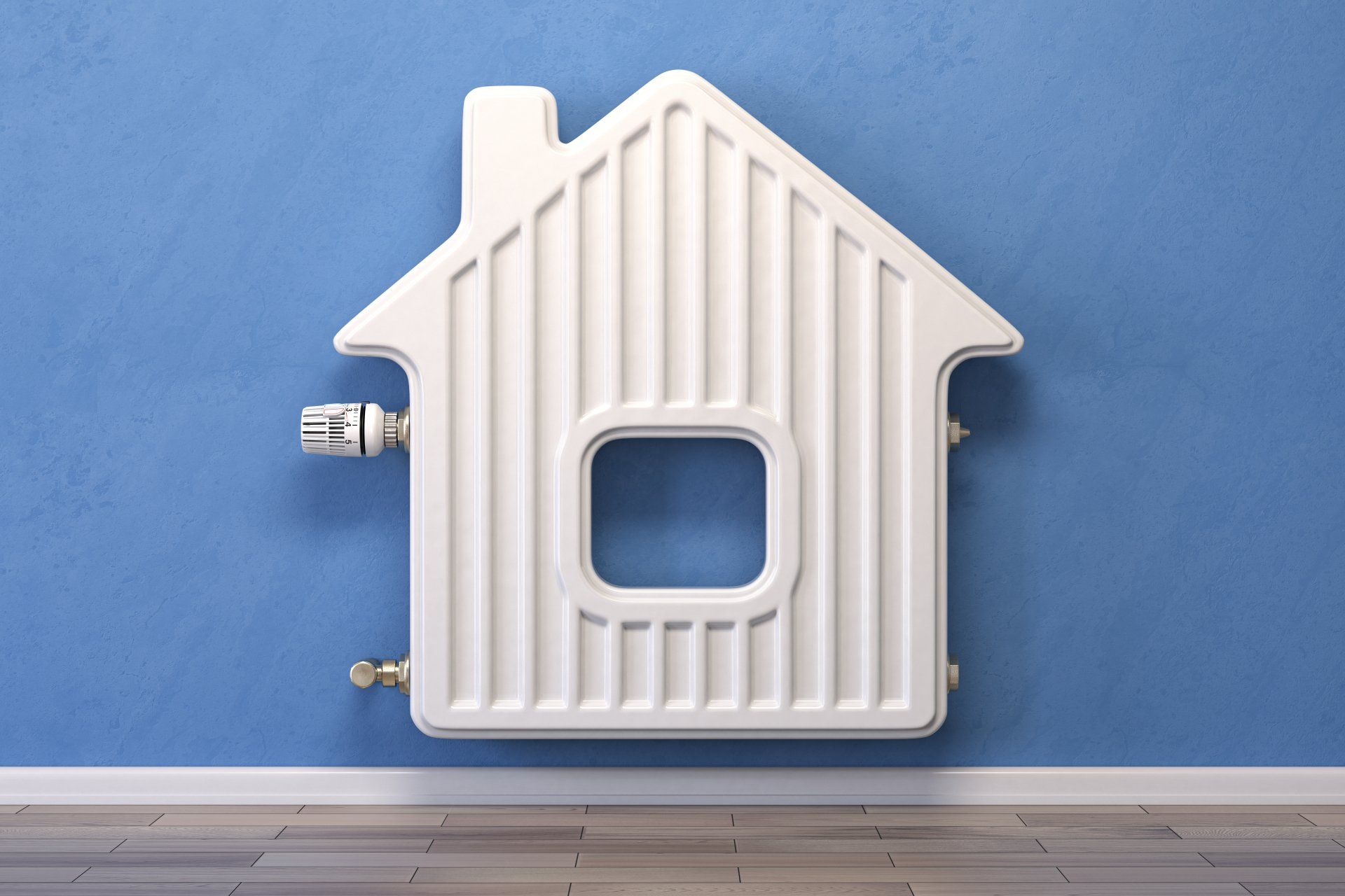 A white radiator in the shape of a house is hanging on a blue wall.