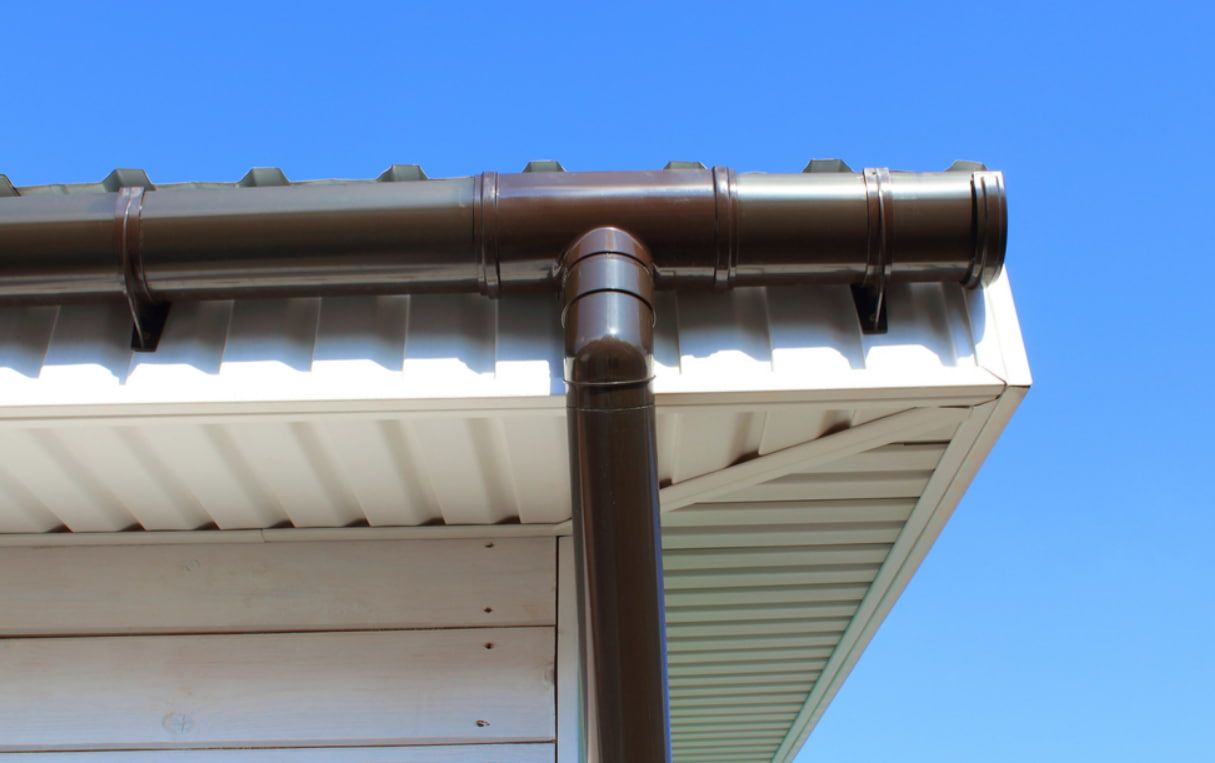 A Gutter Brown Pipe — GT Metal Roofing Solutions in Shoalhaven, NSW