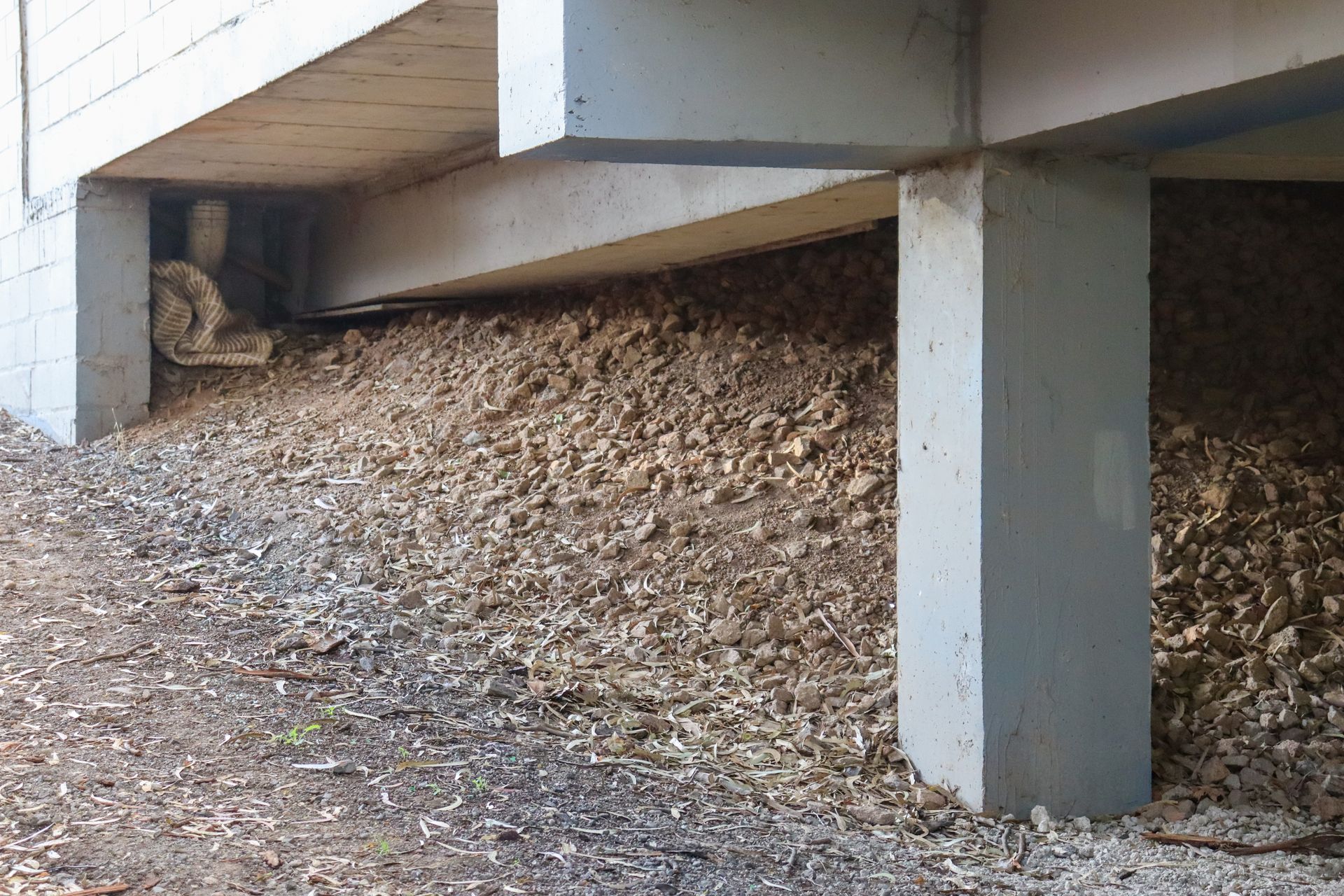 View of concrete stumps in the foundation of a home. View of concrete stumps in the foundation of a home.