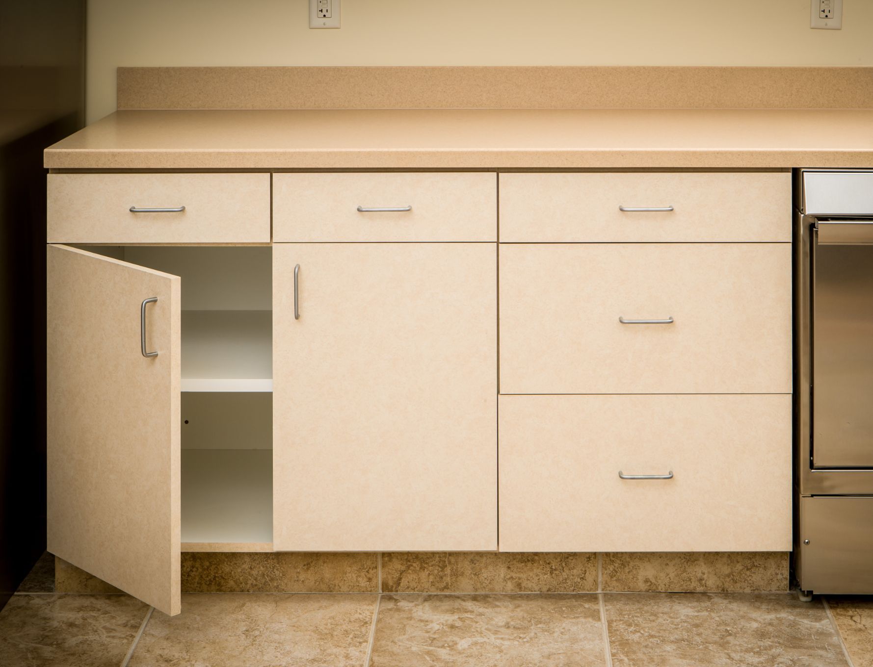 Tan Kitchen Counter And Cabinet — Kitchen Design Experts in Central Coast, NSW