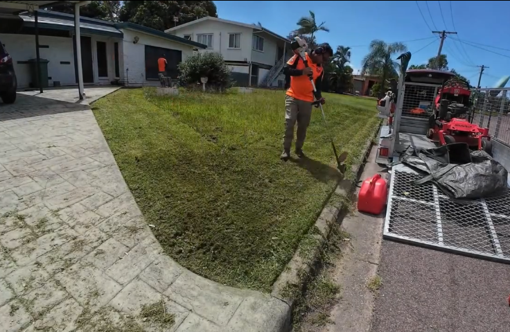 Lush Green Lawn With Curving Edges, Bordered — Hanta Mowing Services Townsville in Kirwan, QLD