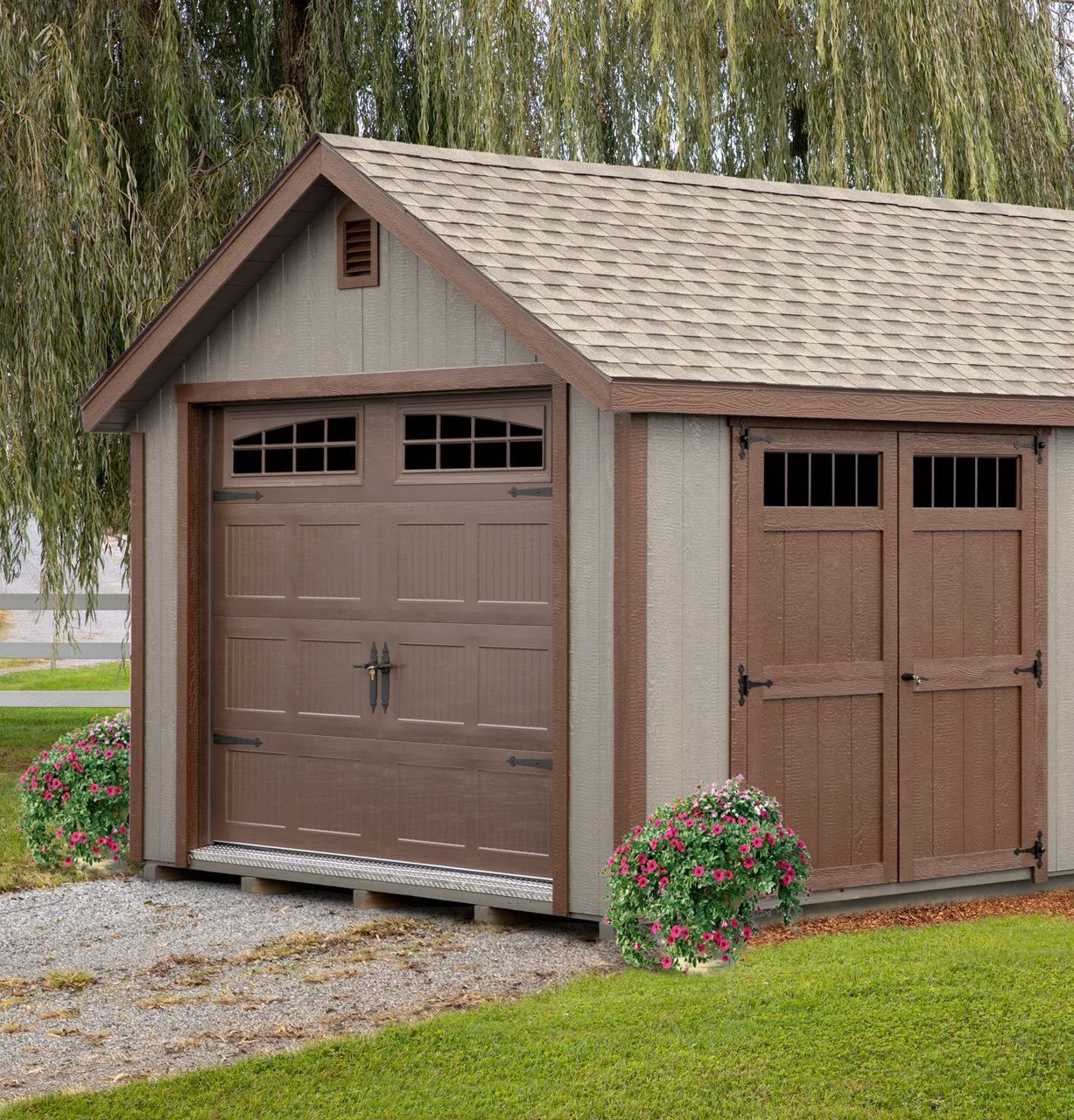 gray shed An Amish-built garage with a copper cupola on top of it