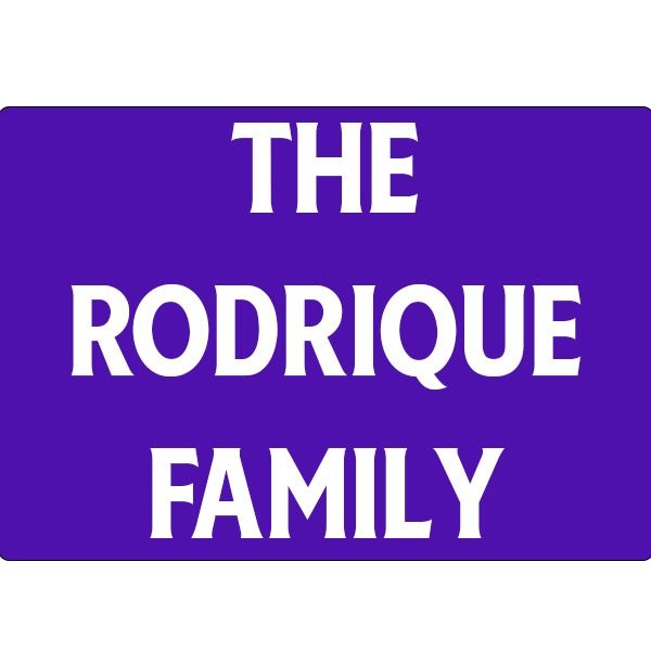 Purple sign with white text reading “THE RODRIQUE FAMILY”