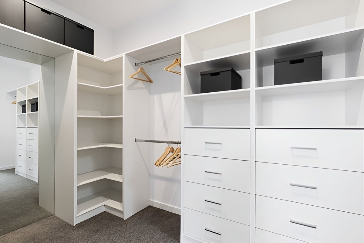 A Wardrobe with White cabinets— Mackay Cabinetmaking Service In Glenella, QLD