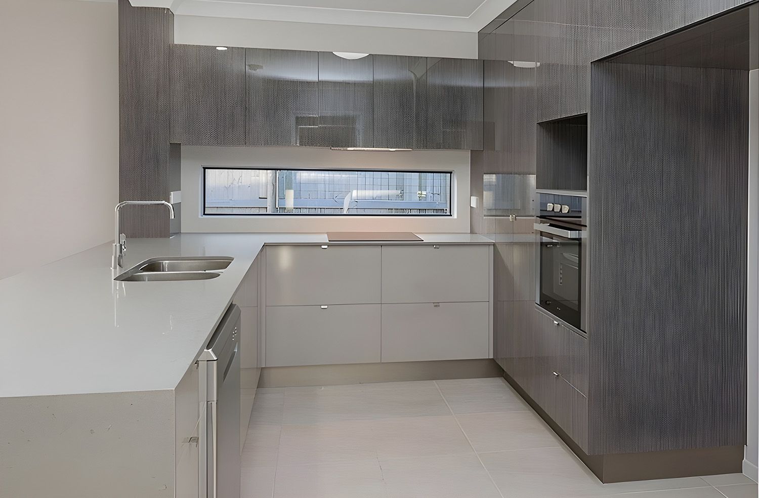 Modern Kitchen With Gray And Off-White Cabinets