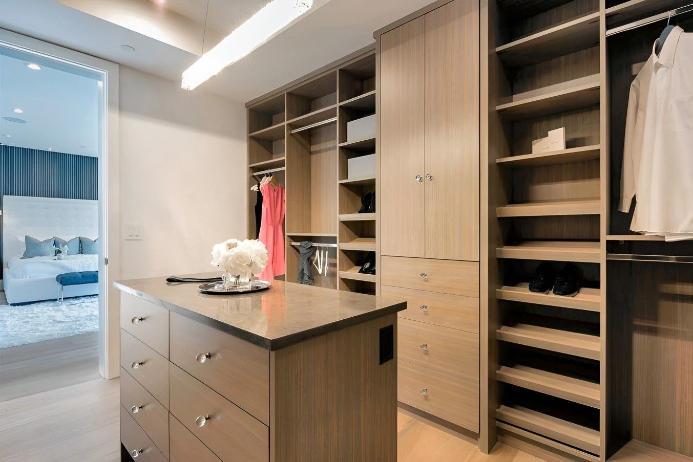 A Walk in Closet With a Large Island in the Middle — Mackay Cabinetmaking Service In Glenella, QLD