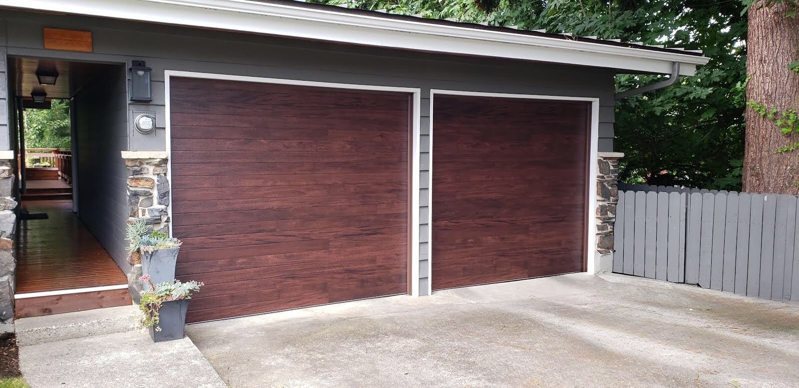 Wood-tone garage door on a two-car garage