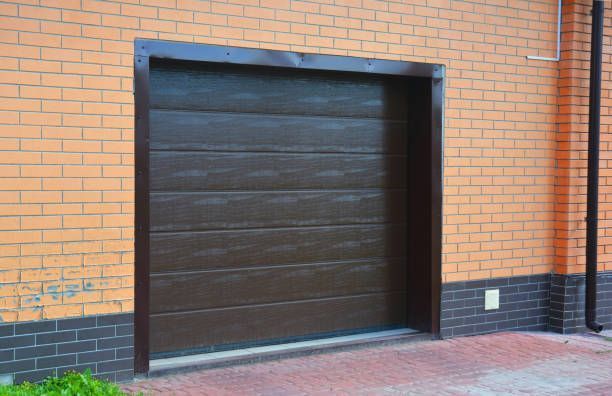 Close-up of a black traditional steel garage door