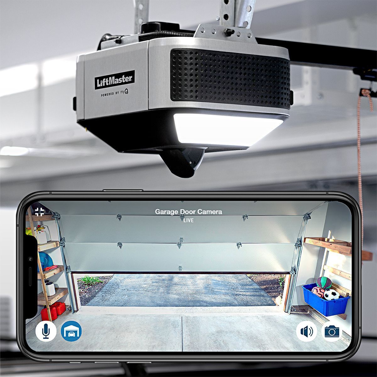 LiftMaster garage door opener mounted above a garage door opening