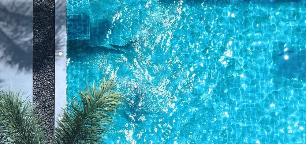 Overhead View of a Swimming Pool With Bright Blue Water — Port Douglas Pool Shop in Craiglie, QLD