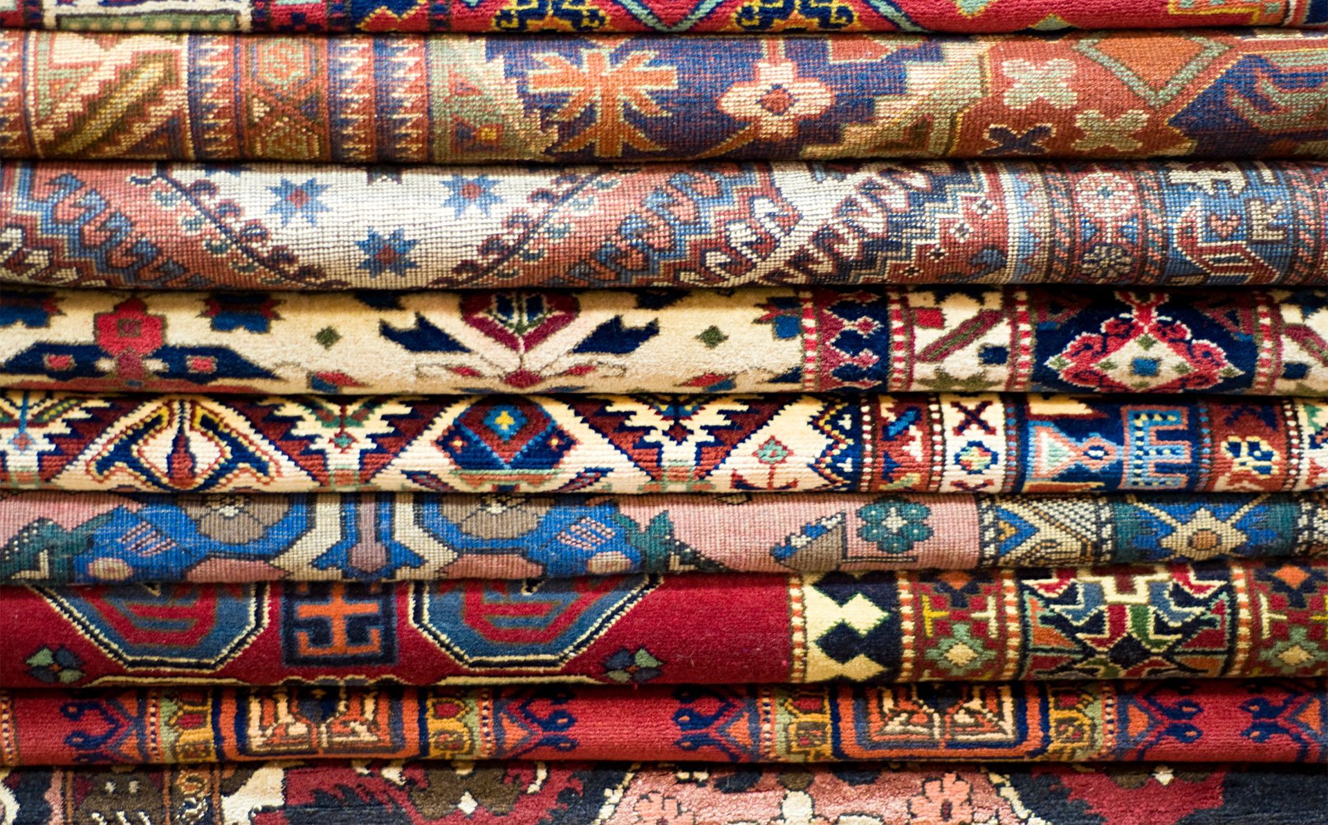 Stack Of Rugs — Madison, WI — Gulesserian’s Oriental Rug Sales & Service