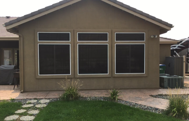 Window Screens — Repairman Installing Bay Window In A New House  In Sparks, NV