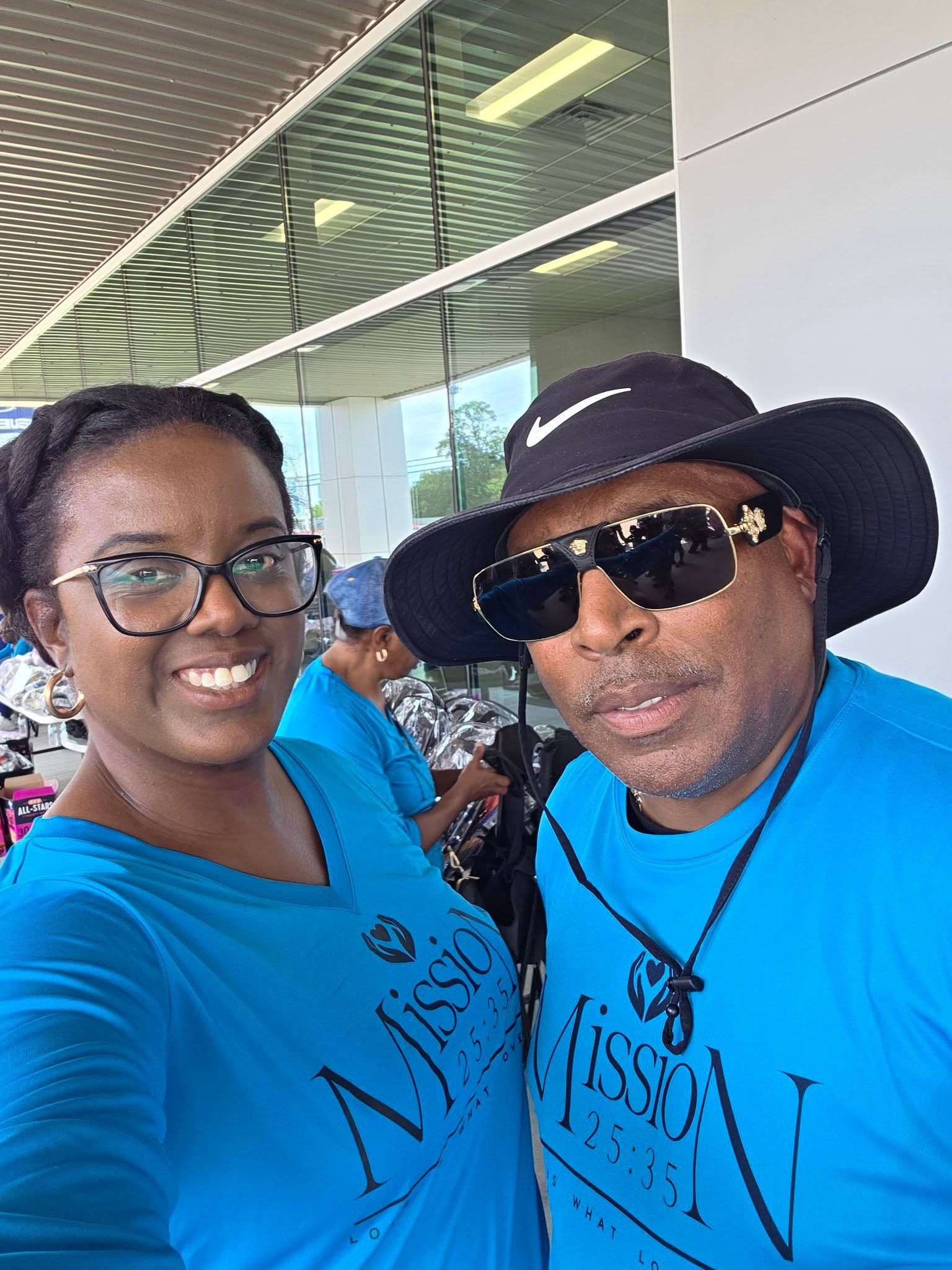Two people in blue 