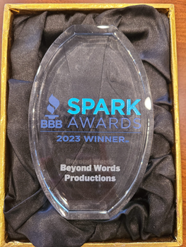 SPARK Awards 2023 winner plaque for Beyond Words Productions in a black satin-lined box SPARK Awards 2023 winner plaque for Beyond Words Productions in a black satin-lined box