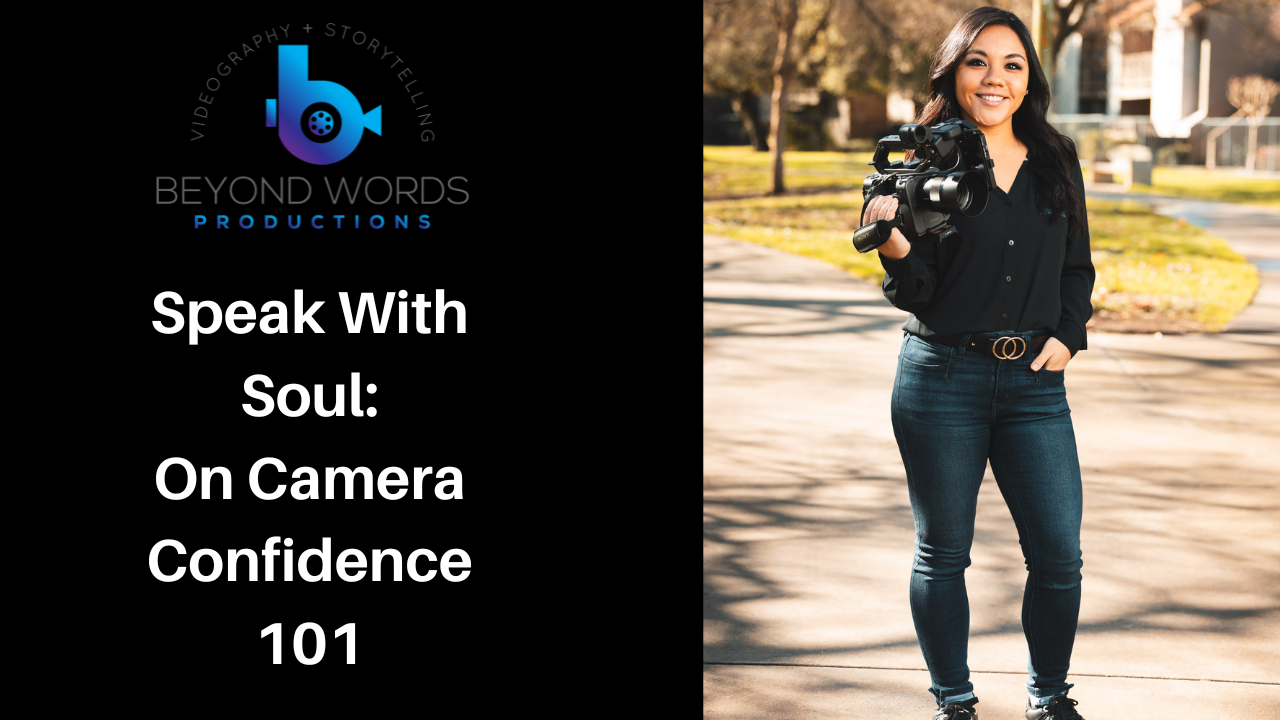 A woman is holding a camera in front of a sign that says speak with soul on camera confidence 101.