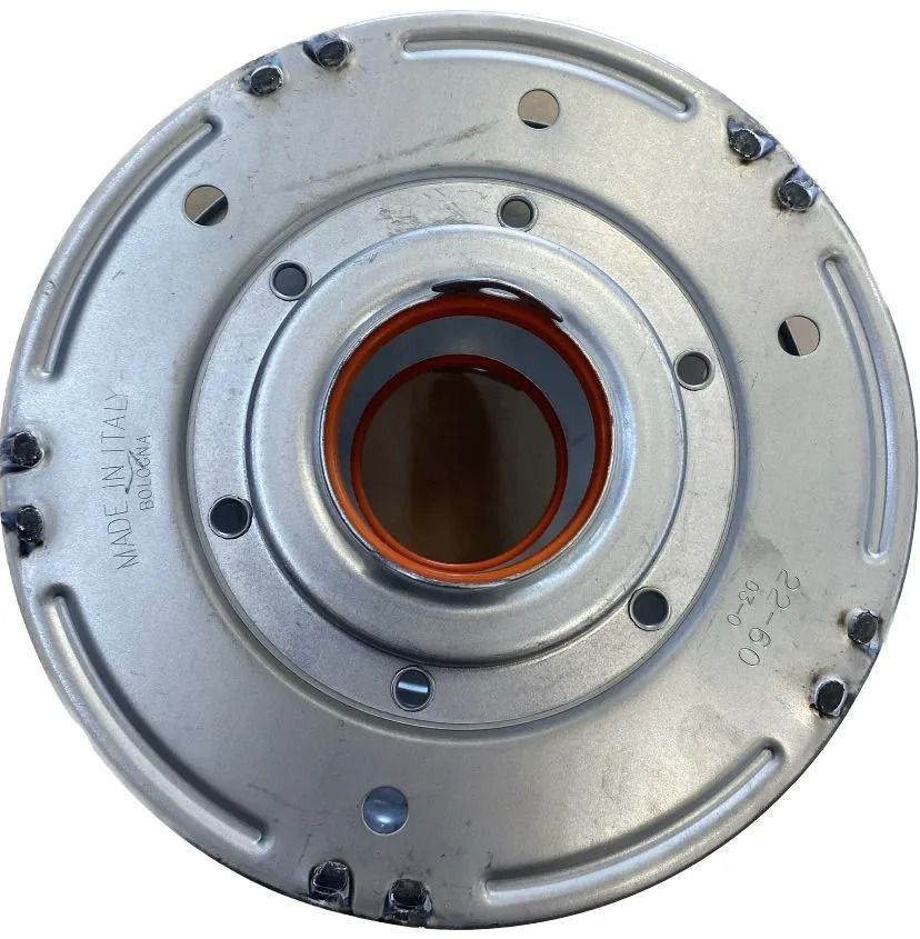 Parte meccanica circolare in metallo argentato con apertura centrale color rame e fori per bulloni.