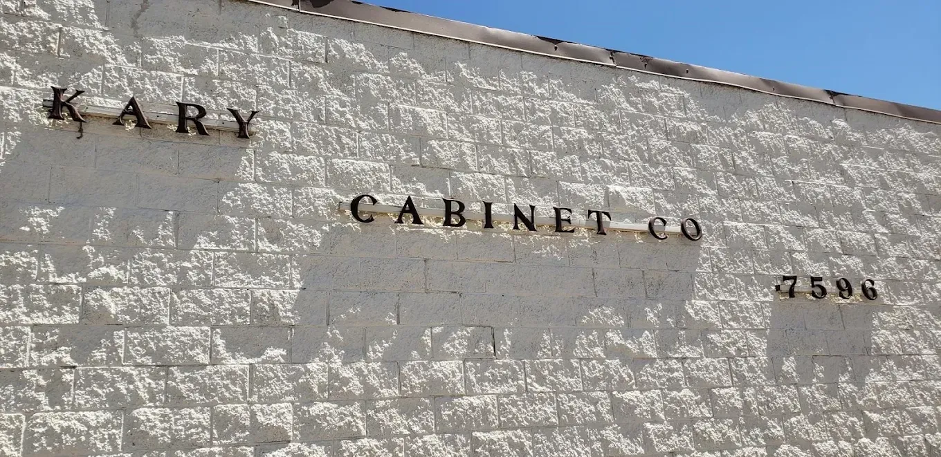 Stone wall of Cary Cabin Co. with black lettering and the number 2598.
