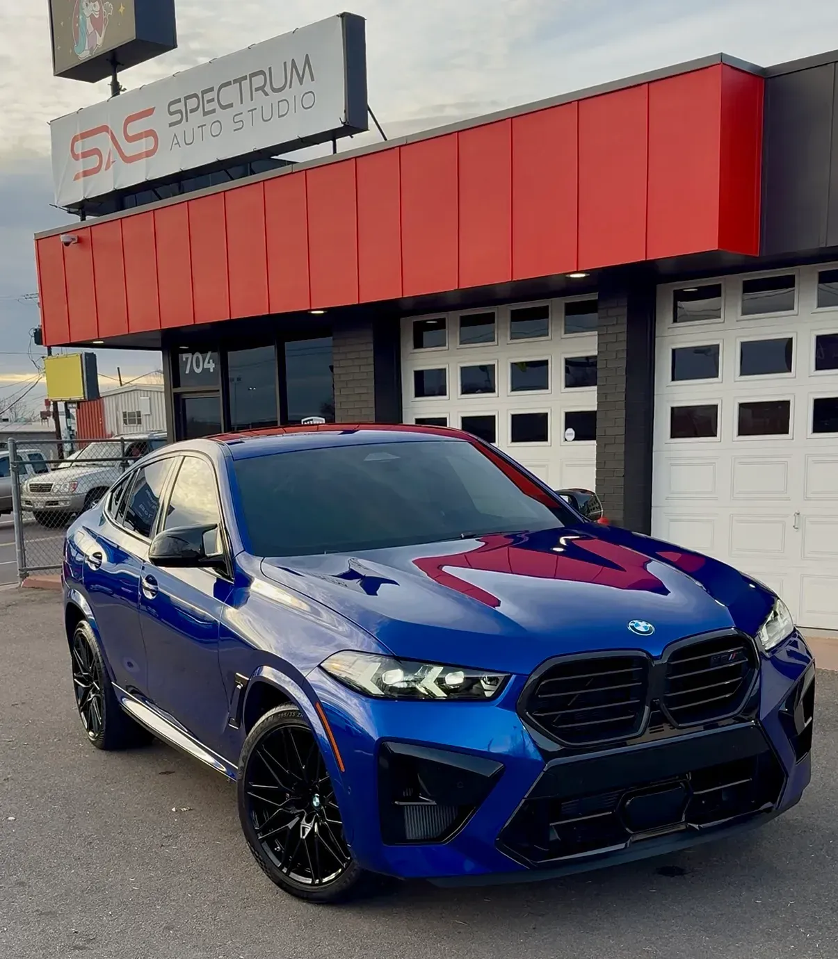 Blue BMW X6M detailed outside Spectrum Auto Studio