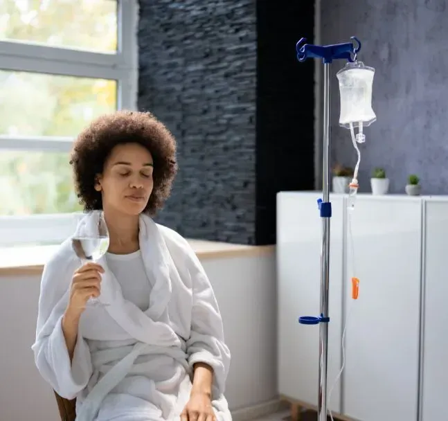 Patient receiving a zinc IV drip session