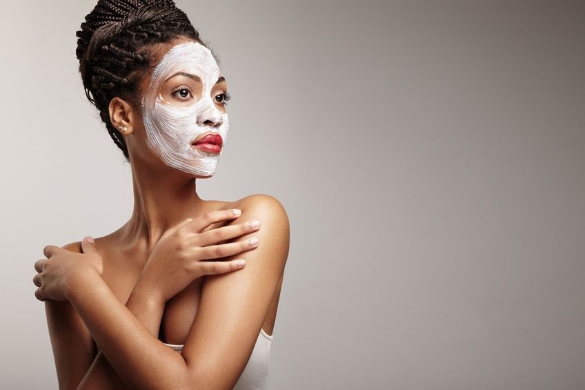 Women apply licensed esthetician on her full face