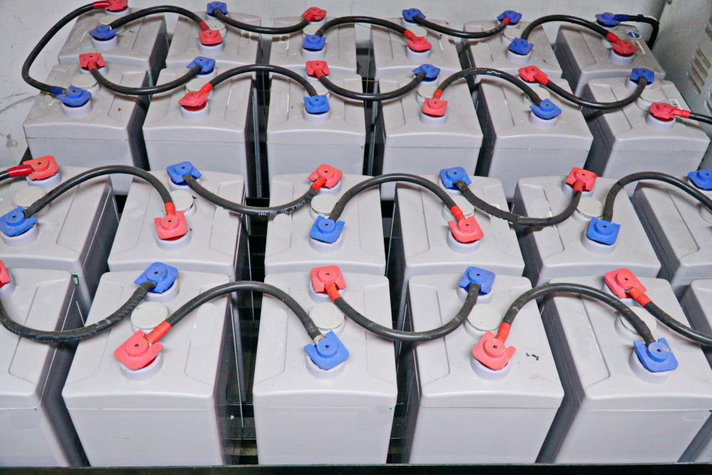 Rows of Gray Batteries Wired Together, Red and Blue Terminals — Pete's Auto Electrical in Cranbourne, VIC