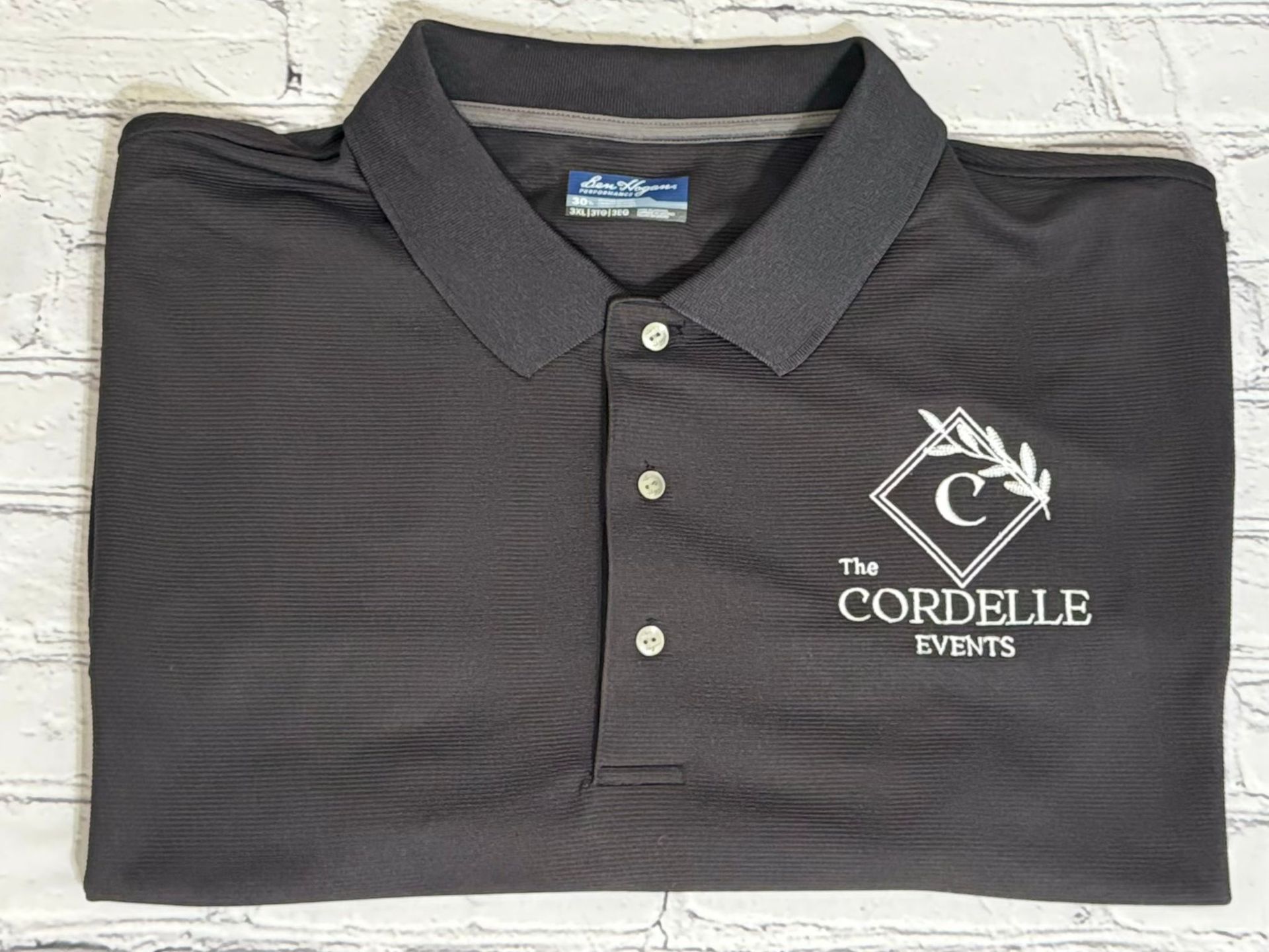 Custom embroidered gray polo for The Cordelle Events by All Things Stitched