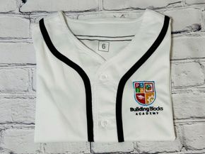 School team jersey with embroidered crest logo