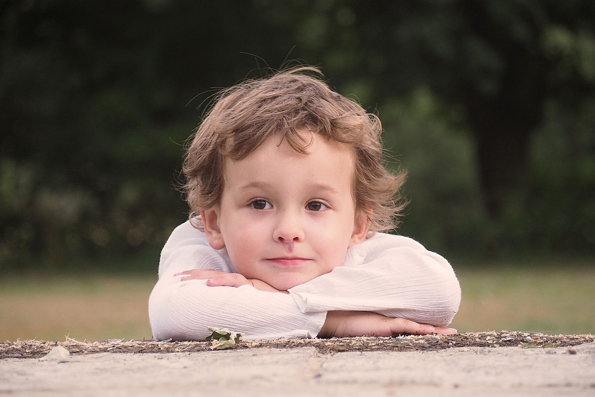 young page boy at outdoor reception at wedding bournemouth poole
