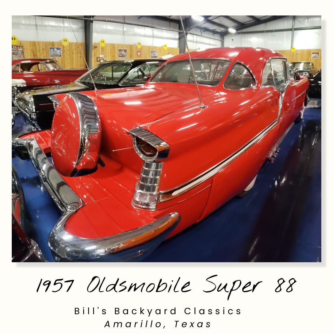 Red 1957 Oldsmobile Super 88 classic car on display at Bill's Backyard Classics, Amarillo, Texas.