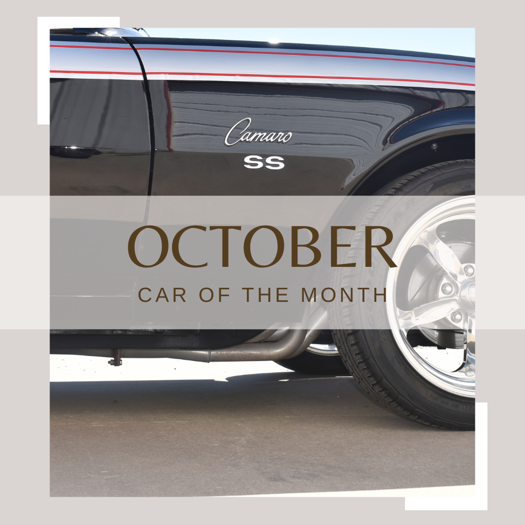 October Car of the Month: Black and silver Camaro SS, chrome exhaust, and a shiny wheel.