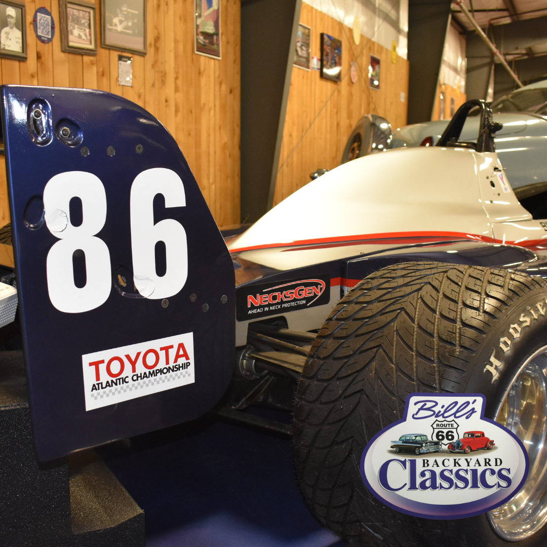 Race car with the number 86, blue and white colors, and Toyota logo.
