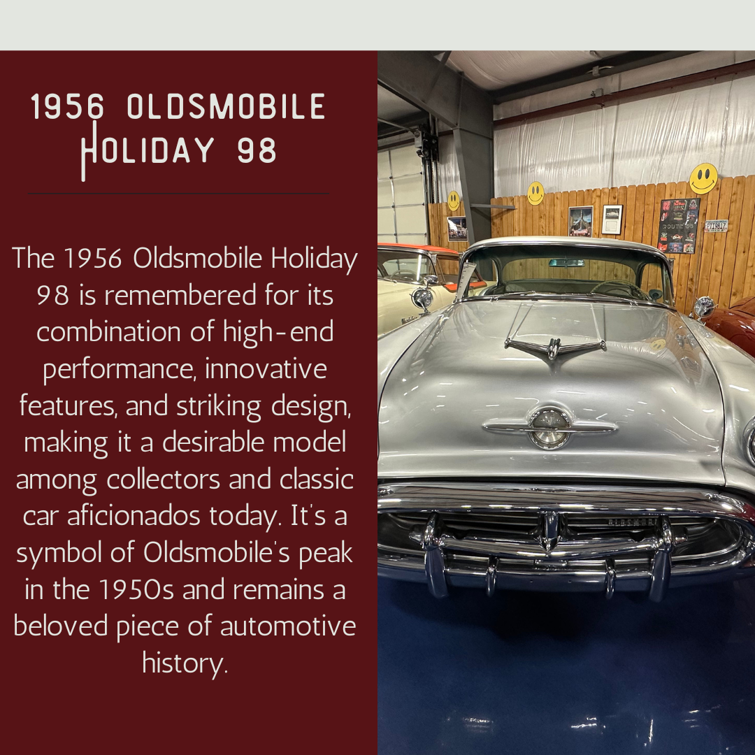 1956 Oldsmobile Holiday 98: Silver car displayed indoors with text describing its features and history.
