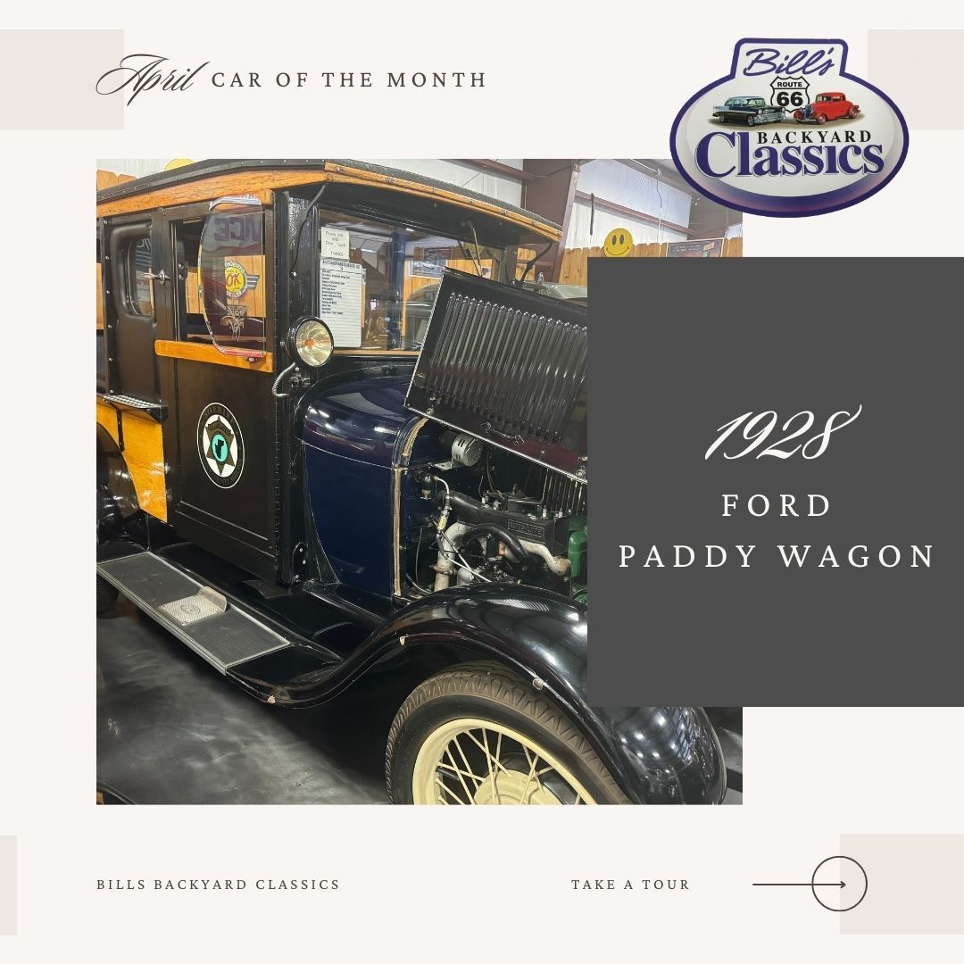 1928 Ford Paddy Wagon, April Car of the Month, black and blue vintage vehicle with hood up.