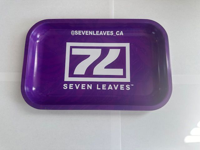 Purple Seven Leaves rolling tray with white logo on a white surface.
