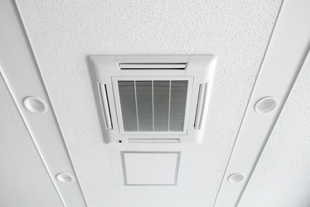 Ceiling Mounted Cassette Type Air Conditioner — Cairns & Cape Electrical In Woree, QLD