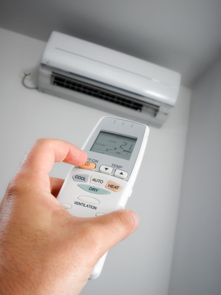 Close Up View Of Air Conditioner Remote — Cairns & Cape Electrical In Woree, QLD