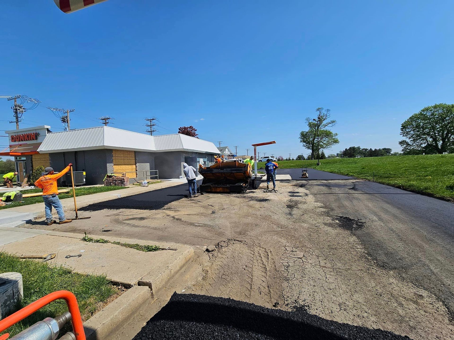Dunkin Driveway Before — New Castle, DE — Lopez General Contractors LLC