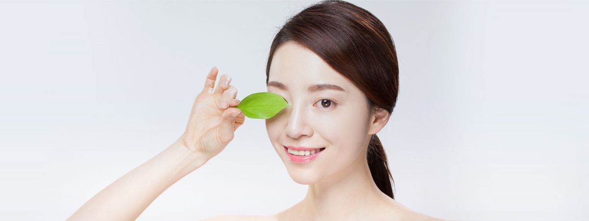 Woman holding a leaf — vaginal laser rejuvenation and intimate skin care in Seoul