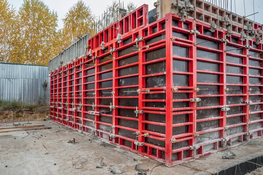 A Large Concrete Wall Is Being Built on A Construction Site — FBM Fabrication In Dapto, NSW