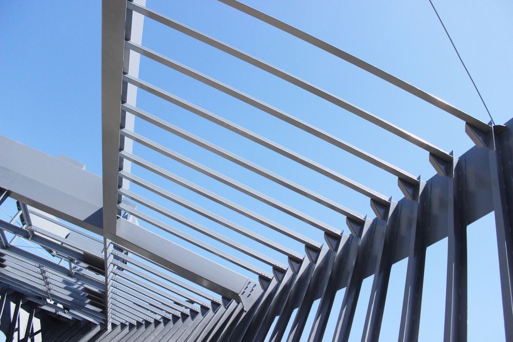 Looking up At a Metal Structure with A Blue Sky in The Background — FBM Fabrication In Dapto, NSW