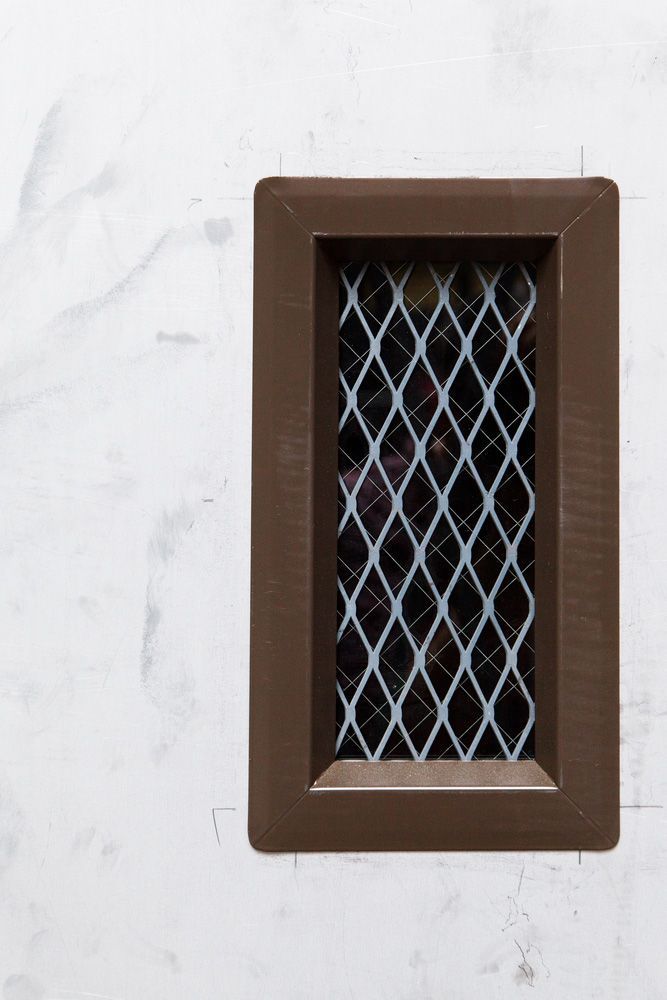 A Picture Frame Is Hanging on A White Wall — FBM Fabrication In Wollongong, NSW