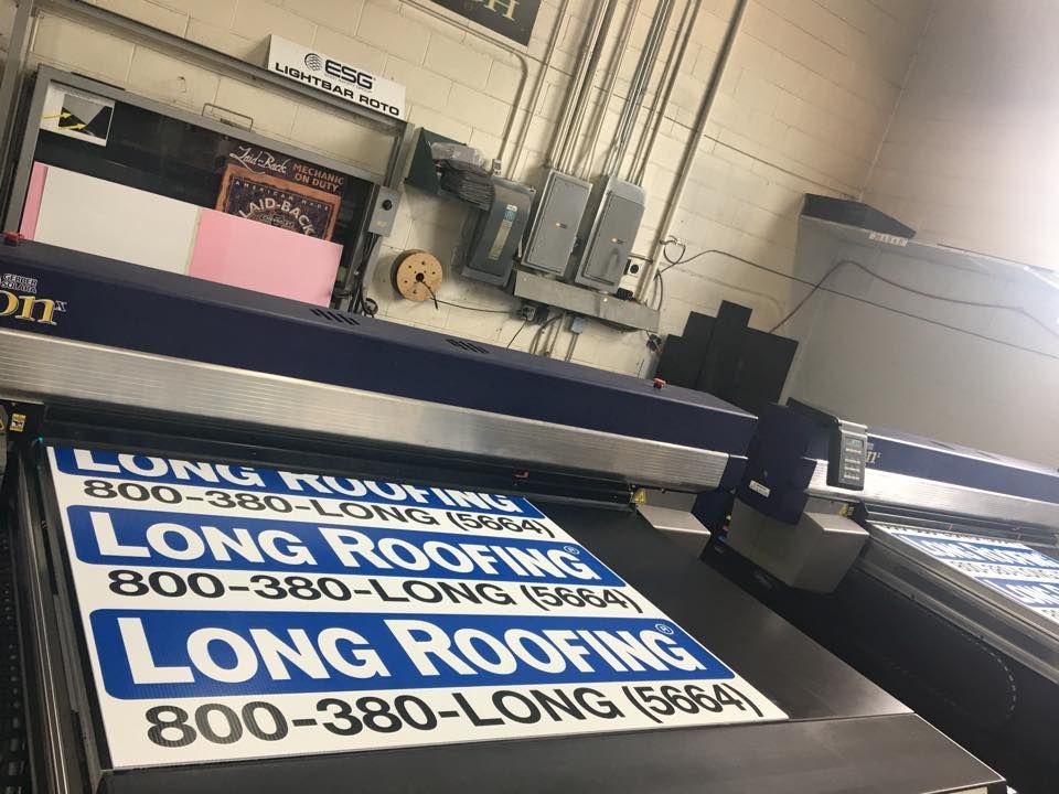 A commercial printer printing multiple 