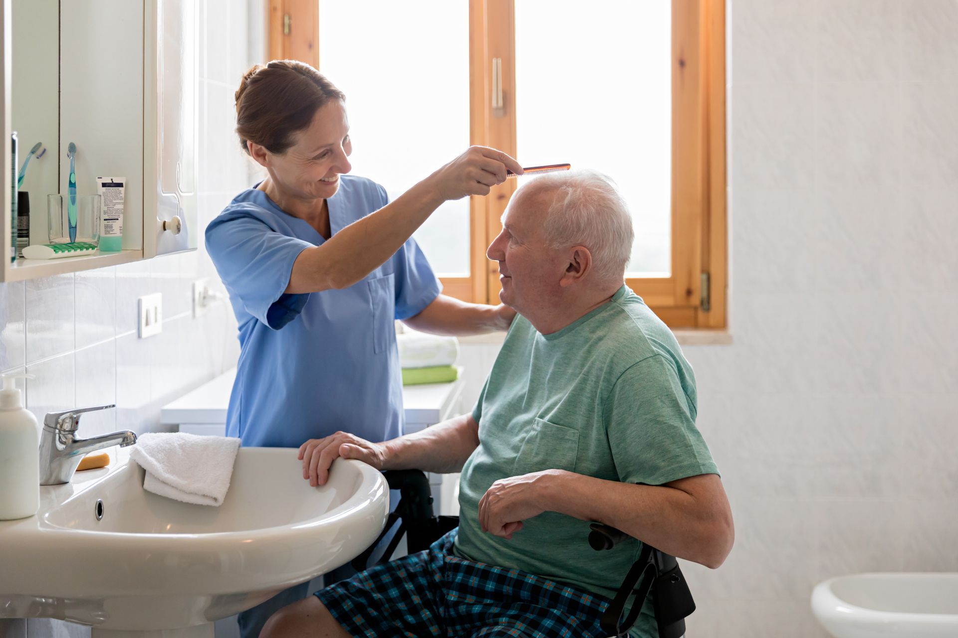 Caregiver Combing Hair - Omaha, NE - Always at Home Supportive Living LLC